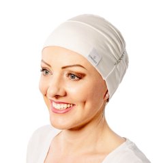 Tenká biela bavlnená čiapka pre onkologické pacientky po chemoterapii Canaver. Čiapka na alopéciu.